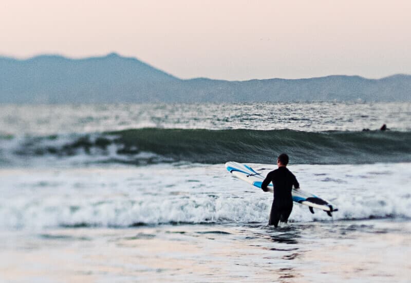 Person heading into the ocean